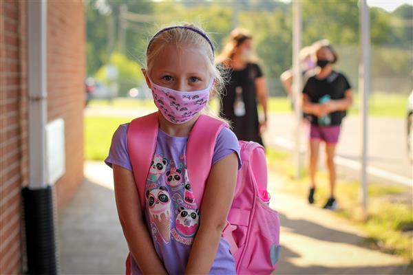 student smiles on first day of school